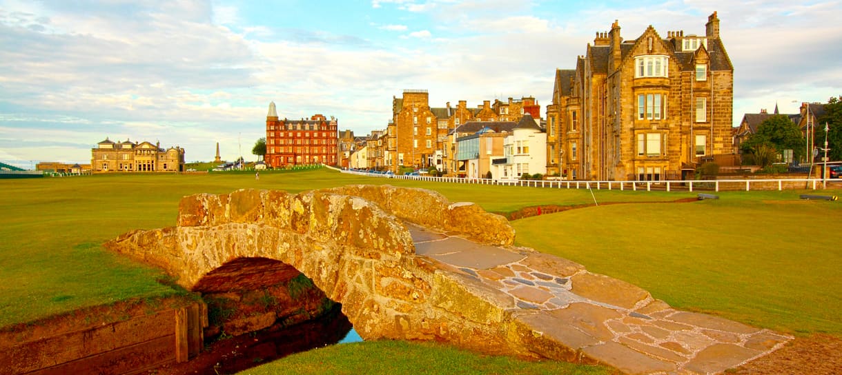1. St Andrews – The home of golf a castle on top of a grass covered field