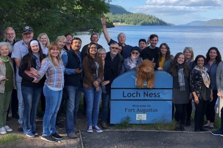 a group of people posing for a photo