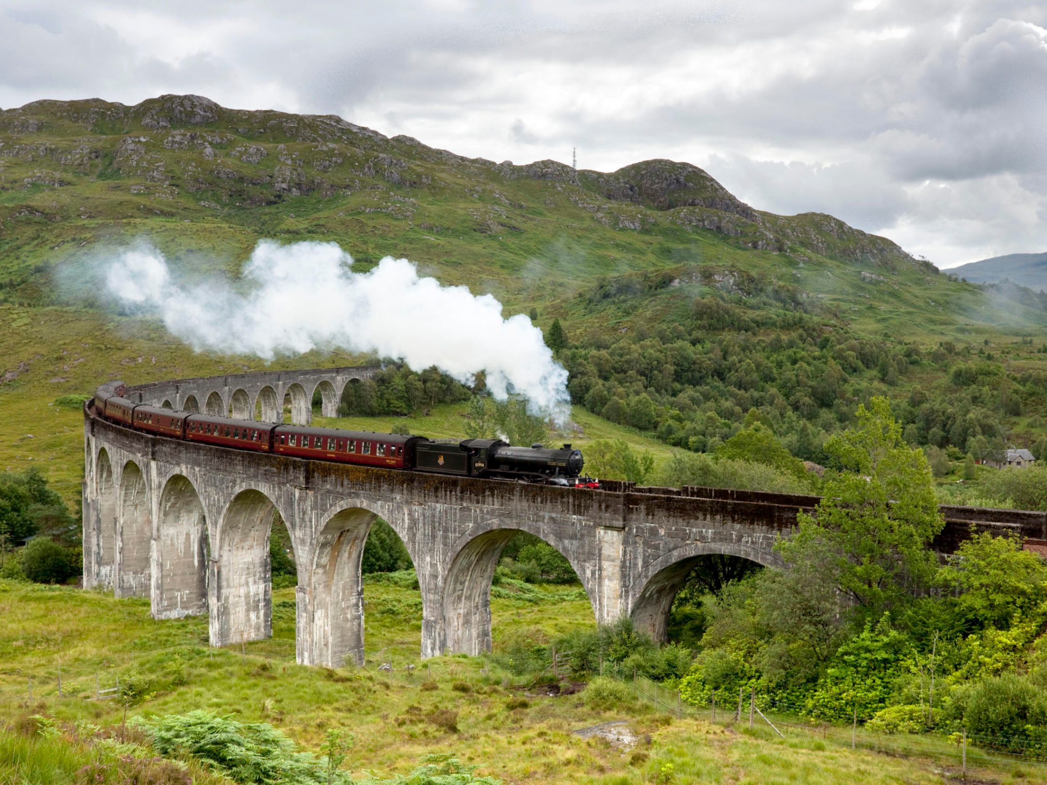 a train traveling over a bridge