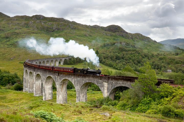 a train traveling over a bridge