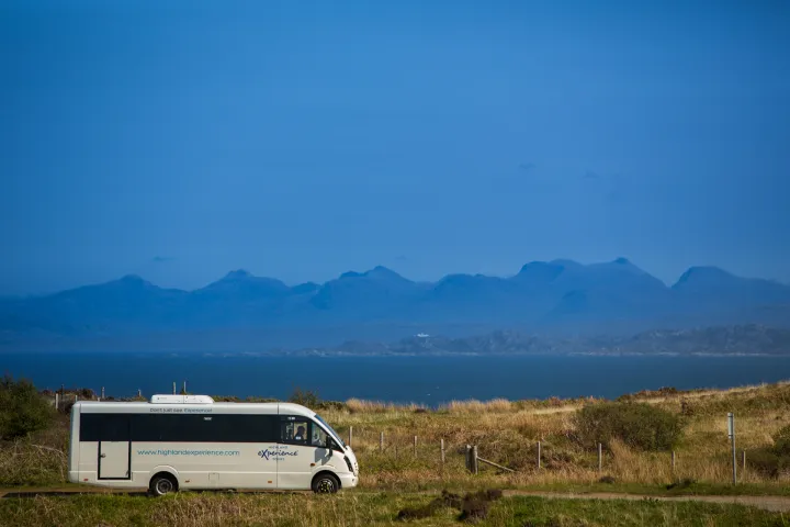a truck with a mountain in the background