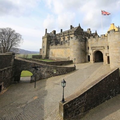 a castle on top of a stone building