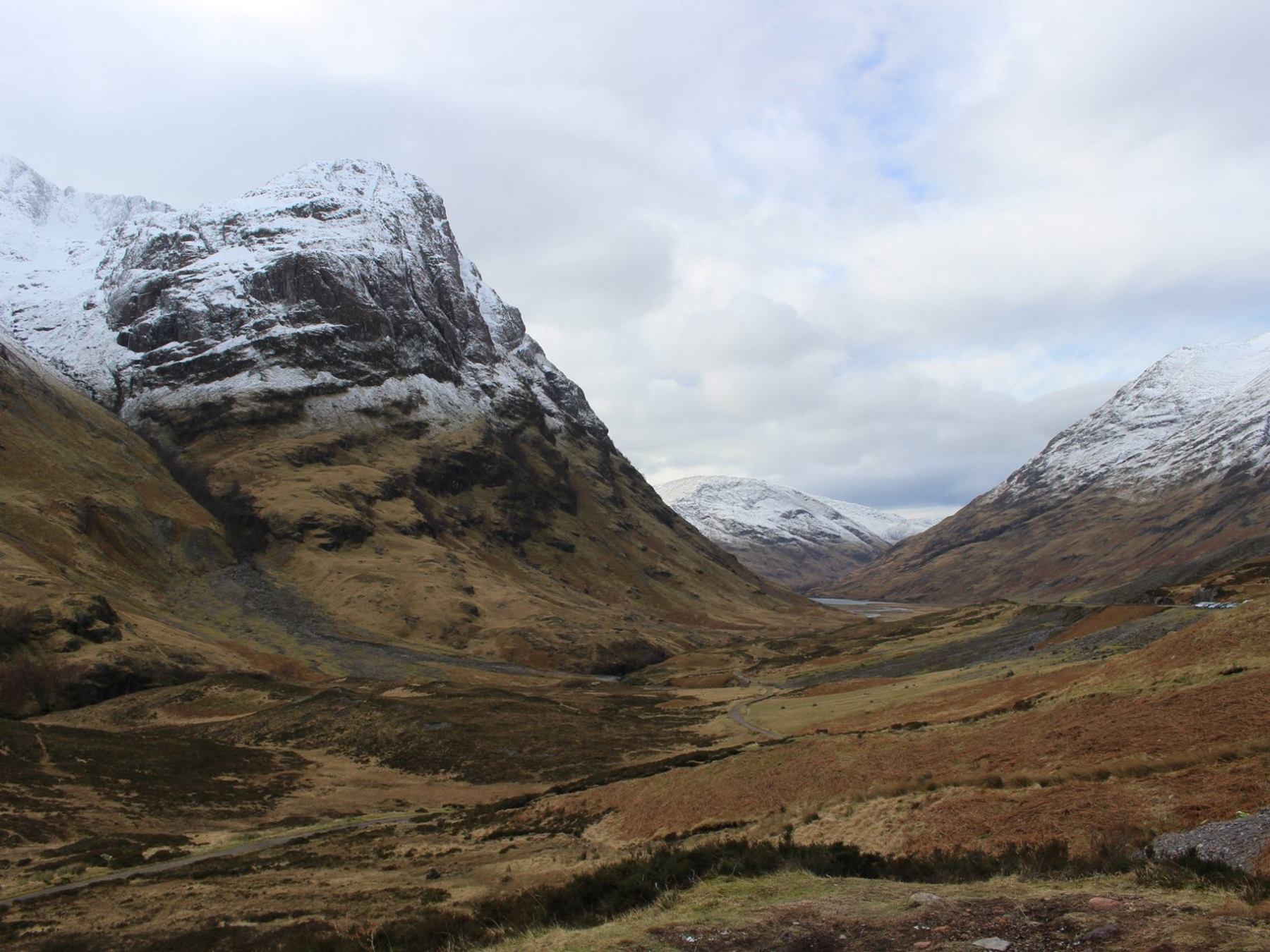a large mountain in the background