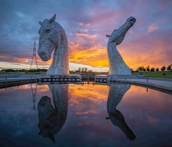 a sunset over a body of water