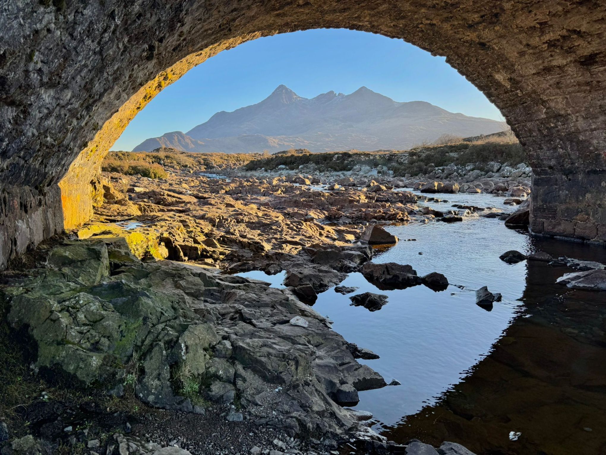 water next to the rock