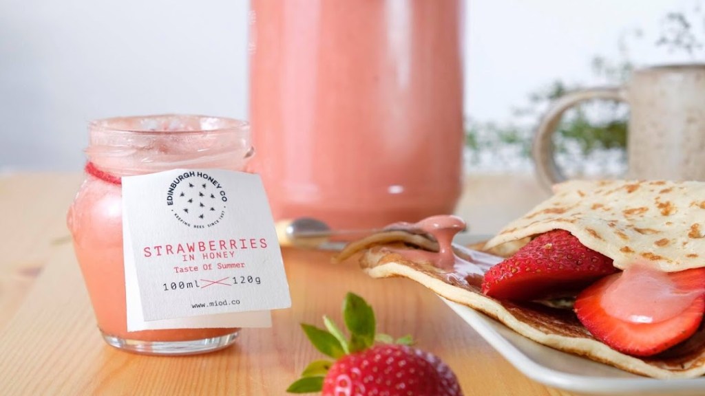 a plate of food and a cup of coffee on a table