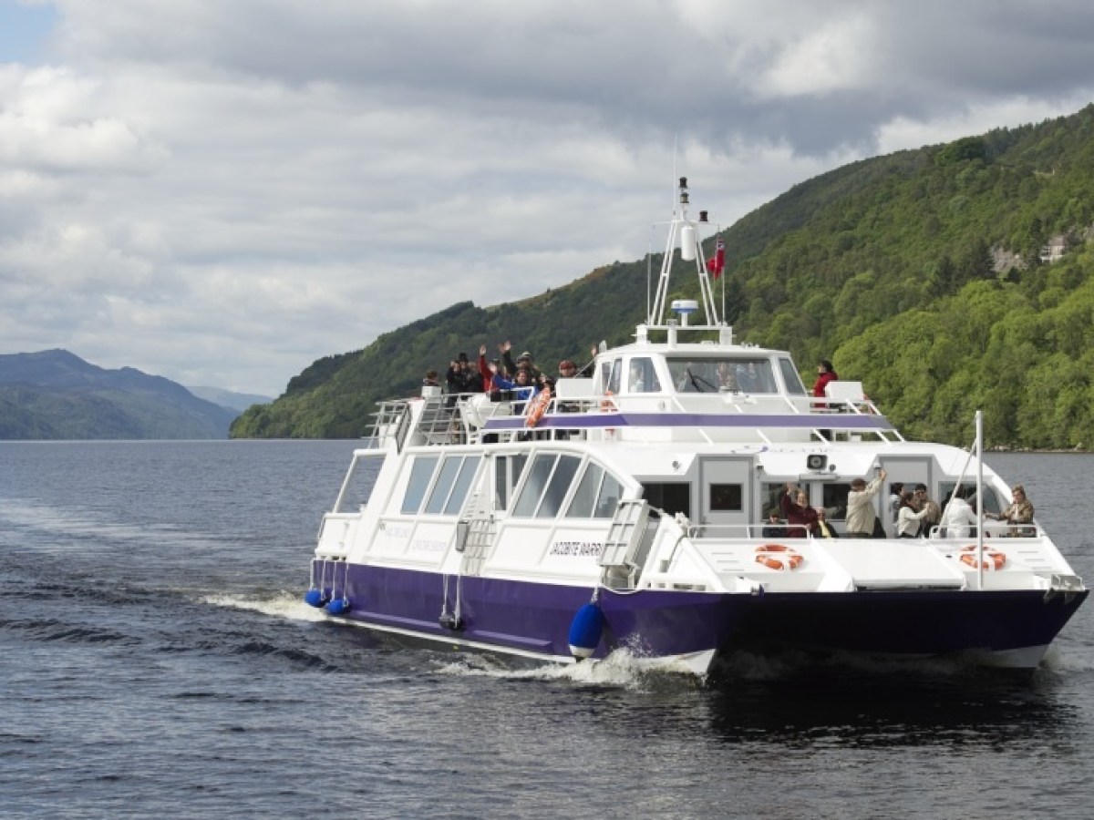 a small boat in a large body of water
