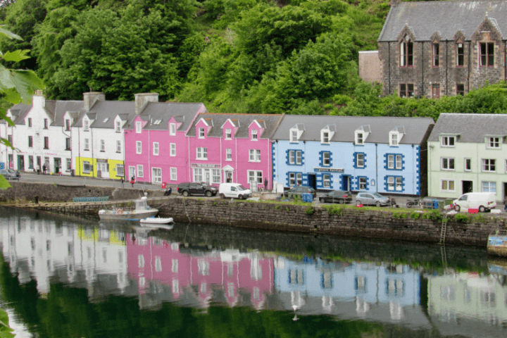 Colourful houses in Portree on Isle of Skye, over a body of water
