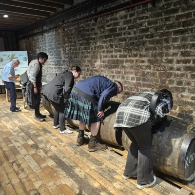 a group of people on a sidewalk