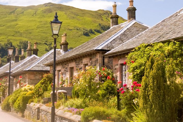 a church with a mountain in the background