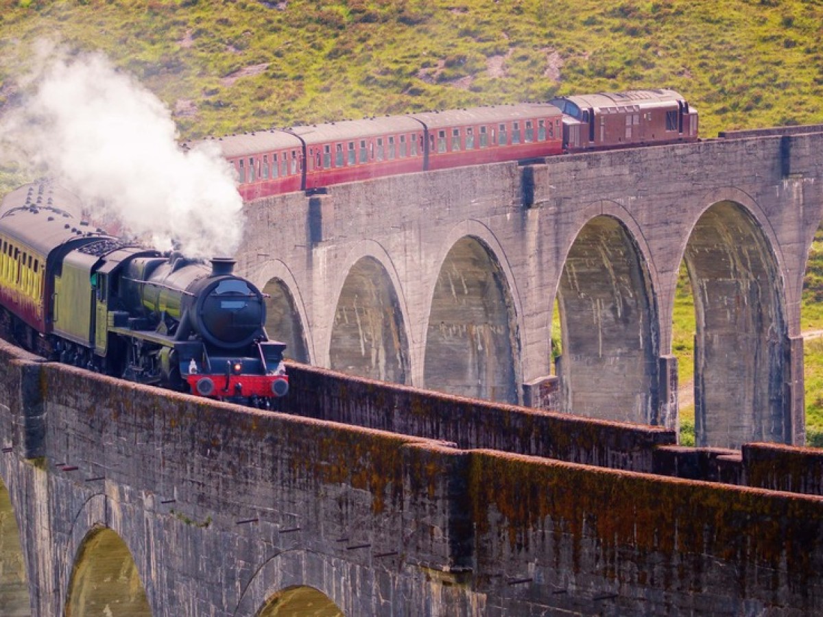 a train traveling over a bridge