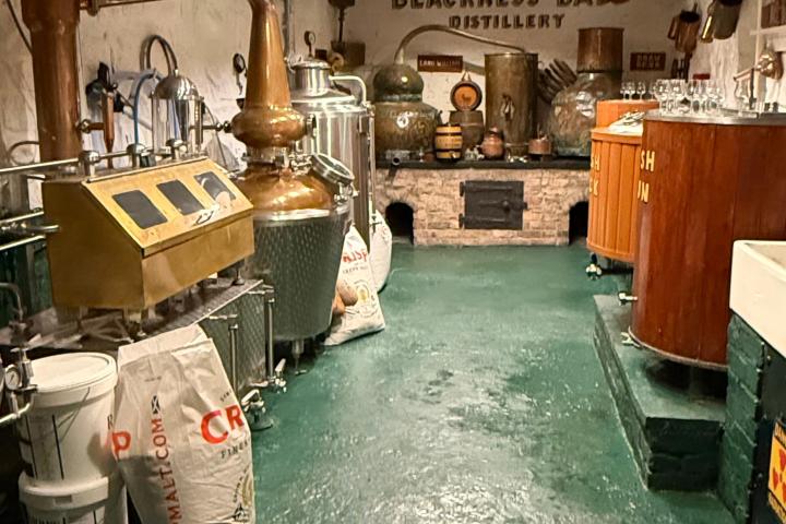 a kitchen with a table and chairs
