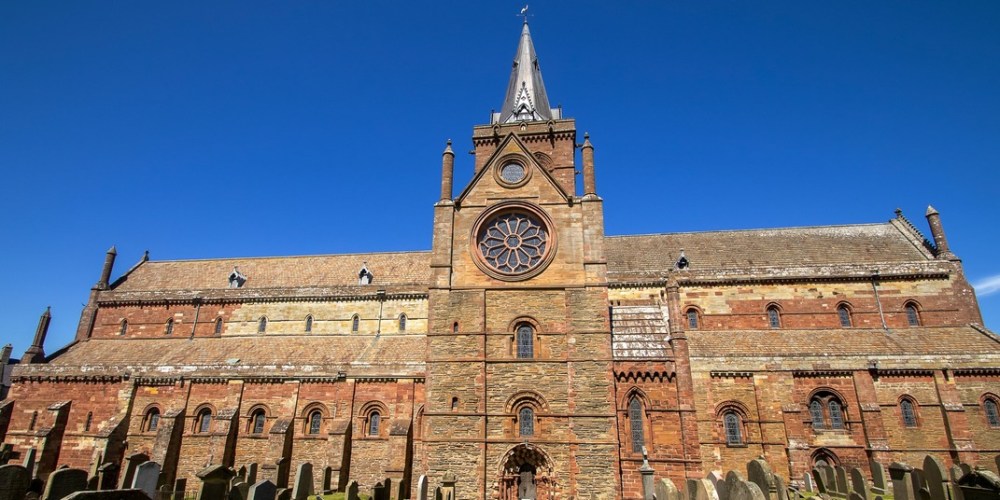 a large brick building with a clock tower